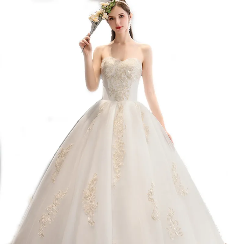 Luxurious wedding dress with long sleeves and an elegant train for a fairytale princess look