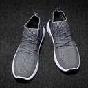 Men’s Skechers knit shoe with exceptional stretch and a lightweight design