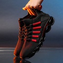 Men’s athletic shoes featuring woven mesh and a modern design