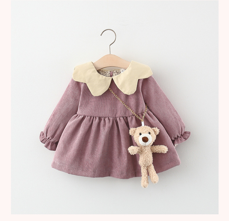 Elegant Corduroy Baby Dress with a Cute Cartoon Bear Bag – A unique design that offers your little one both comfort and style 