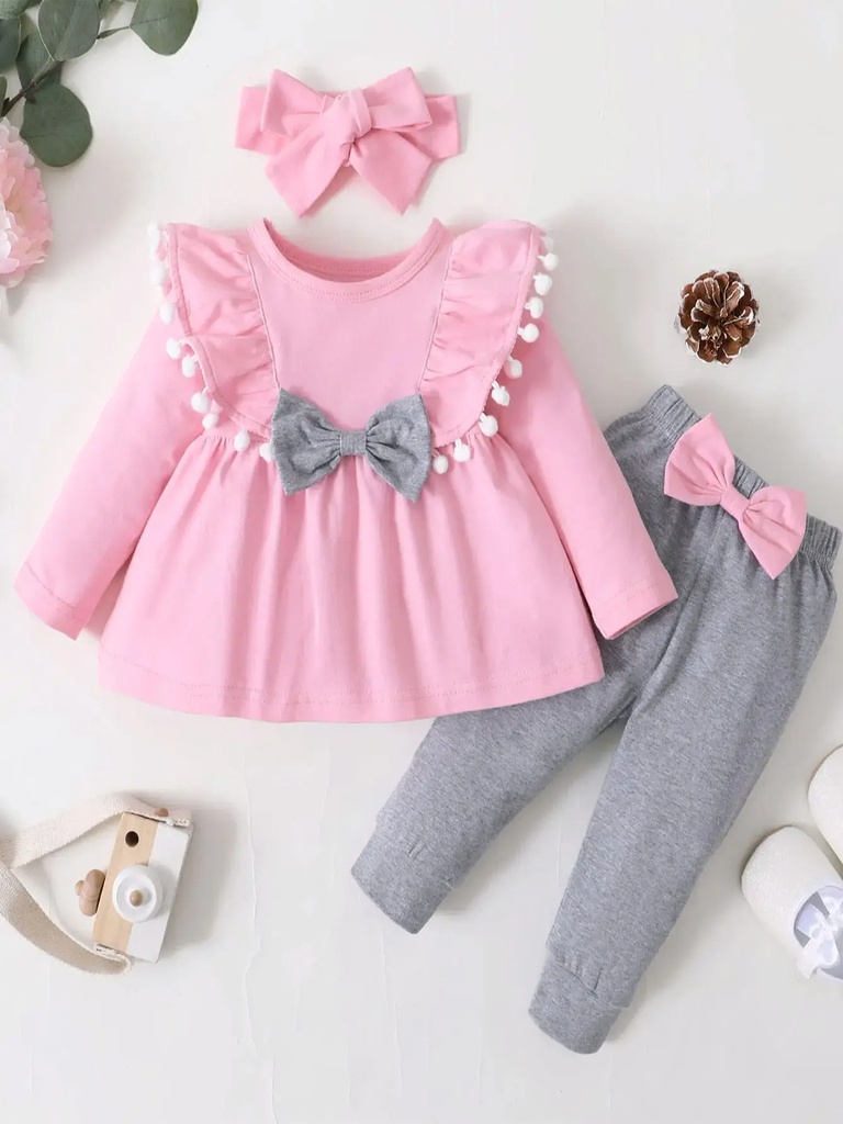 A trendy set featuring a long-sleeve top with stylish gray pants, perfect for a comfortable and chic look 