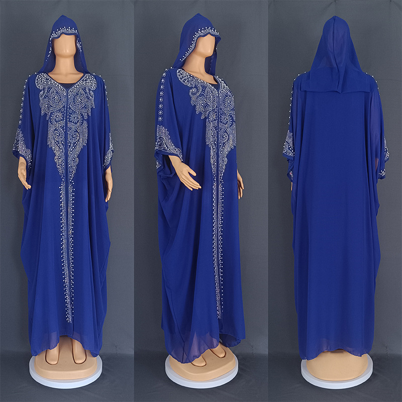An abaya decorated with rhinestones, featuring an elegant and authentic Arabic design 