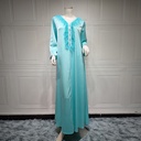 A kaftan dress with a unique and elegant design  