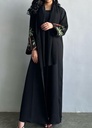 An elegant embroidered cardigan-style dress with long sleeves. 