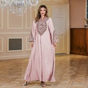 An elegant embroidered dress with a luxurious design, perfect for special occasions.