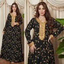 An elegant Moroccan kaftan with exquisite details reflecting luxury and rich heritage