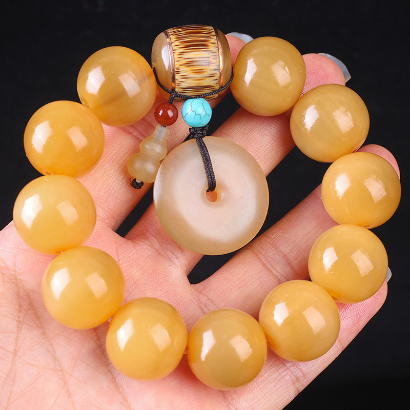 A luxurious misbaha made of golden yak horn