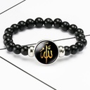 An elegant bracelet with an Islamic touch, adorned with bead charms and snap buttons for a refined and distinctive look