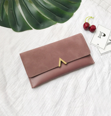 A stylish and versatile wallet with a refined design and ample capacity