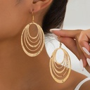 Circular Earrings Made of Stainless Steel with a Three-Layer Hollow Oval Design, featuring a modern and unique look with an elegant and decorative touch