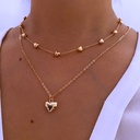 Double-Layer Heart Necklace with a delicate chain, this multilayered gold-colored metal necklace exudes modern elegance, making it the perfect accessory to add a touch of luxury and charm to your look