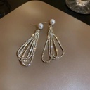 Elegant earrings featuring a drop shape, adorned with full diamonds and pearls, complemented by long tassels for a luxurious and sophisticated look