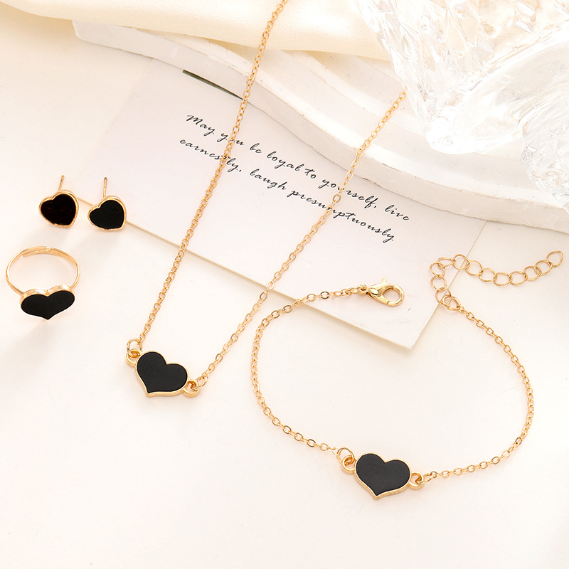 An elegant necklace and heart-designed jewelry set, adding a touch of love and charm to your look