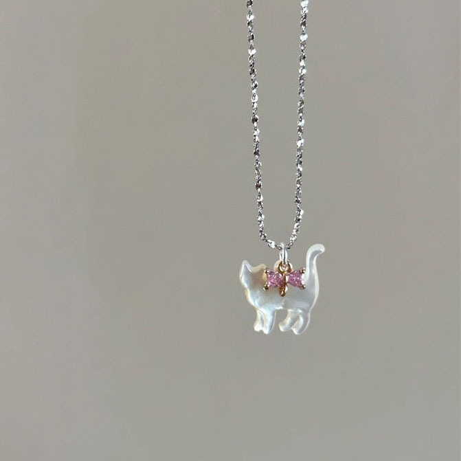Elegant necklace with a transparent cat pendant and rhinestones on a silver-plated chain
