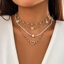 Women's Pearl Necklace Adorned with a Small Daisy Flower in an Elegant and Modern Design