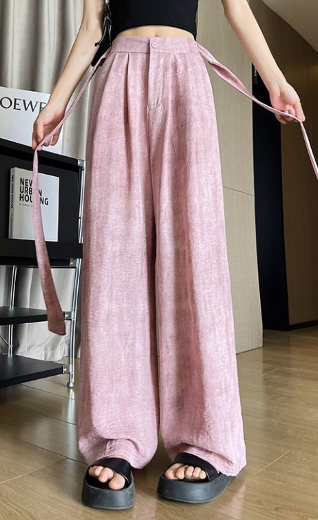 High-waisted wide-leg pants with a modern design, offering an elegant and stylish look
