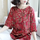 Women's Loose-Fit Summer Blouse with a Modern and Practical Design, Featuring Mid-Length Sleeves and a Round Neck