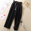 A practical and elegant women's pant featuring a loose casual design with an elastic waistband, offering perfect comfort and a modern look suitable for various occasions