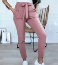 Elegant women's slim-fit pants with a modern cut, inspired by classic British fashion for a refined and distinctive look