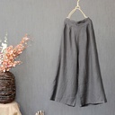 Wide-leg pants with a stylish and modern casual design, made from a comfortable cotton and linen blend, offering a practical and effortless look 