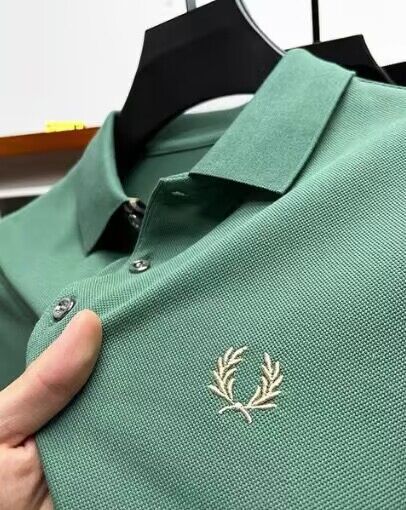 Men's luxury polo shirt with a refined design, featuring half sleeves, a classic collar, and elegant embroidery — perfect for both formal and upscale casual looks 