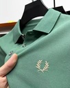 Men's luxury polo shirt with a refined design, featuring half sleeves, a classic collar, and elegant embroidery — perfect for both formal and upscale casual looks 