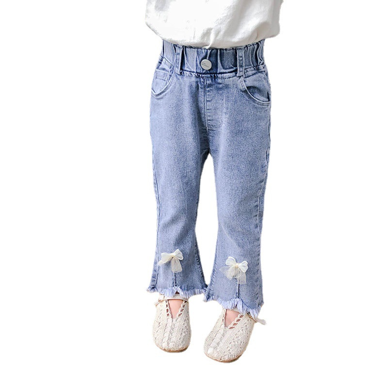 Girls' jeans with a Korean-style wide-leg design, made from comfortable stretch fabric and adorned with elegant feminine details like a bow — offering a modern and practical look