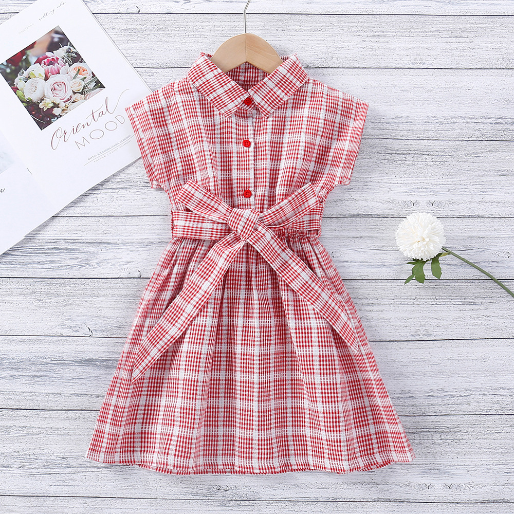 Elegant girls' dress with a plaid pattern and a modern touch inspired by Western style, featuring a princess design that gives your little one a refined and charming look