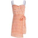 Elegant dress featuring plaid stitching and a waist tie, combining a classic touch with modern style for a chic and feminine look