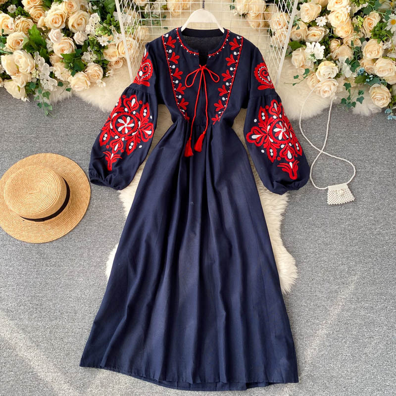 maxi dress with elegant floral embroidery, round neckline, lantern sleeves, and a loose, lightweight fit 