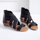 Elegant and comfortable women's sandal featuring a modern Roman design and a low heel that provides stability and all-day comfort