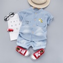 Two-piece denim outfit – short-sleeve shirt paired with shorts