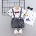 Children's outfit – consists of a short-sleeve shirt and stylish suspenders pants for a comfortable and trendy look