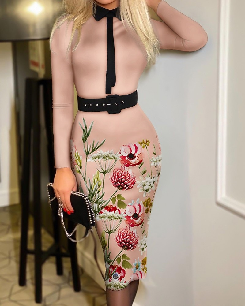 Explosive-style women's dress with bold print and belt – a striking design that adds a touch of elegance and flair to your look
