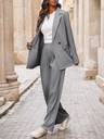 Elegant women's set featuring a notched collar blazer with double buttons and matching pants