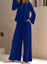 Simple women's set for spring and autumn – round neck long-sleeve top with high-waist wide-leg trousers featuring side pockets