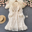Women's long-sleeve dress with an over-the-knee length, featuring an elegant and comfortable design perfect for everyday wear