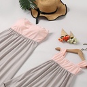 Stylish summer dress for mother and daughter featuring an off-shoulder, backless design with patchwork details that create a coordinated and modern look for both