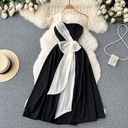 Princess-style A-line dress with contrasting colors and a slim waist that highlights your femininity with an elegant look