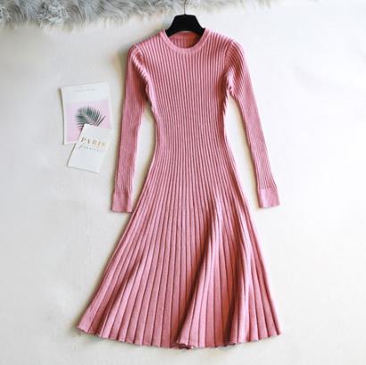 Knitted A-line dress featuring a round neckline and long sleeves, combining elegance and comfort for a perfect look