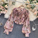 Soft chiffon shirt with a slim-fitting design, featuring elegant ruffles, feminine pleats, and puff sleeves that add a delicate and modern touch