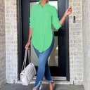Loose-fit solid color shirt with a polo collar and long sleeves, featuring modern stitching details