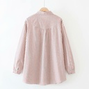 Oversized striped long-sleeve shirt inspired by classic style for an elegant and comfortable look