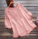 Elegant women's peplum top with flared sleeves — perfect for both casual and formal looks