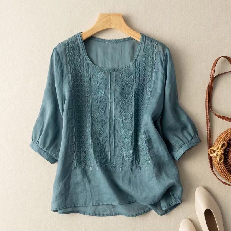 Loose embroidered blouse made from a cotton-linen blend for a comfortable look