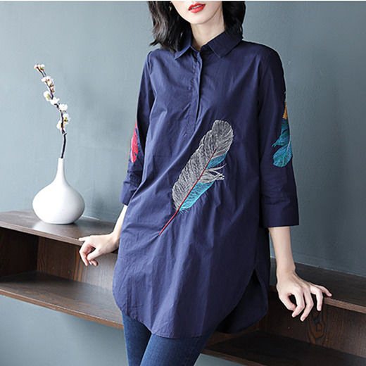 Elegant and modern women's blouse with a mid-length design