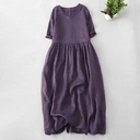 Elegant dress with short sleeves and a modern below-the-knee design