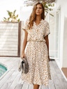 Elegant women's dress featuring a distinctive print and an adjustable drawstring waist