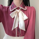 Embroidered lace shirt with a doll collar and bow tie for an elegant feminine look