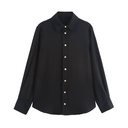 French-style shirt with gold buttons, tassels, and long sleeves